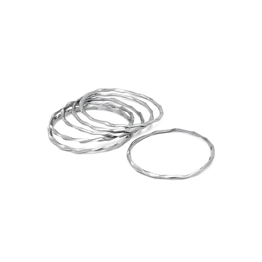 Vestopazzo Wavy Bangle Bracelet Set of 6 – Stacked matte silver hammered wavy thin bangle bracelets on white background | Místika Style