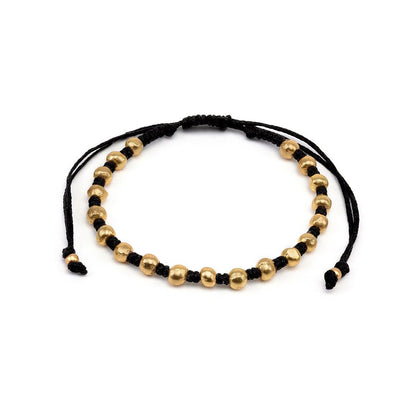 Vestopazzo Gold Bead Black Cord Bracelet – Adjustable black macramé bracelet with polished gold sphere beads on white background | Místika Style