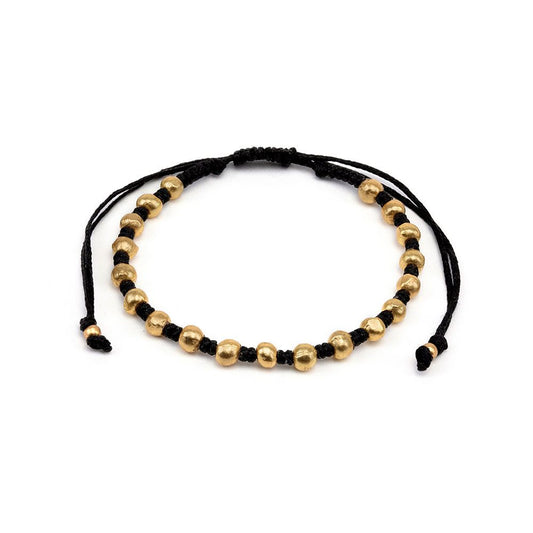 Vestopazzo Gold Bead Black Cord Bracelet – Adjustable black macramé bracelet with polished gold sphere beads on white background | Místika Style