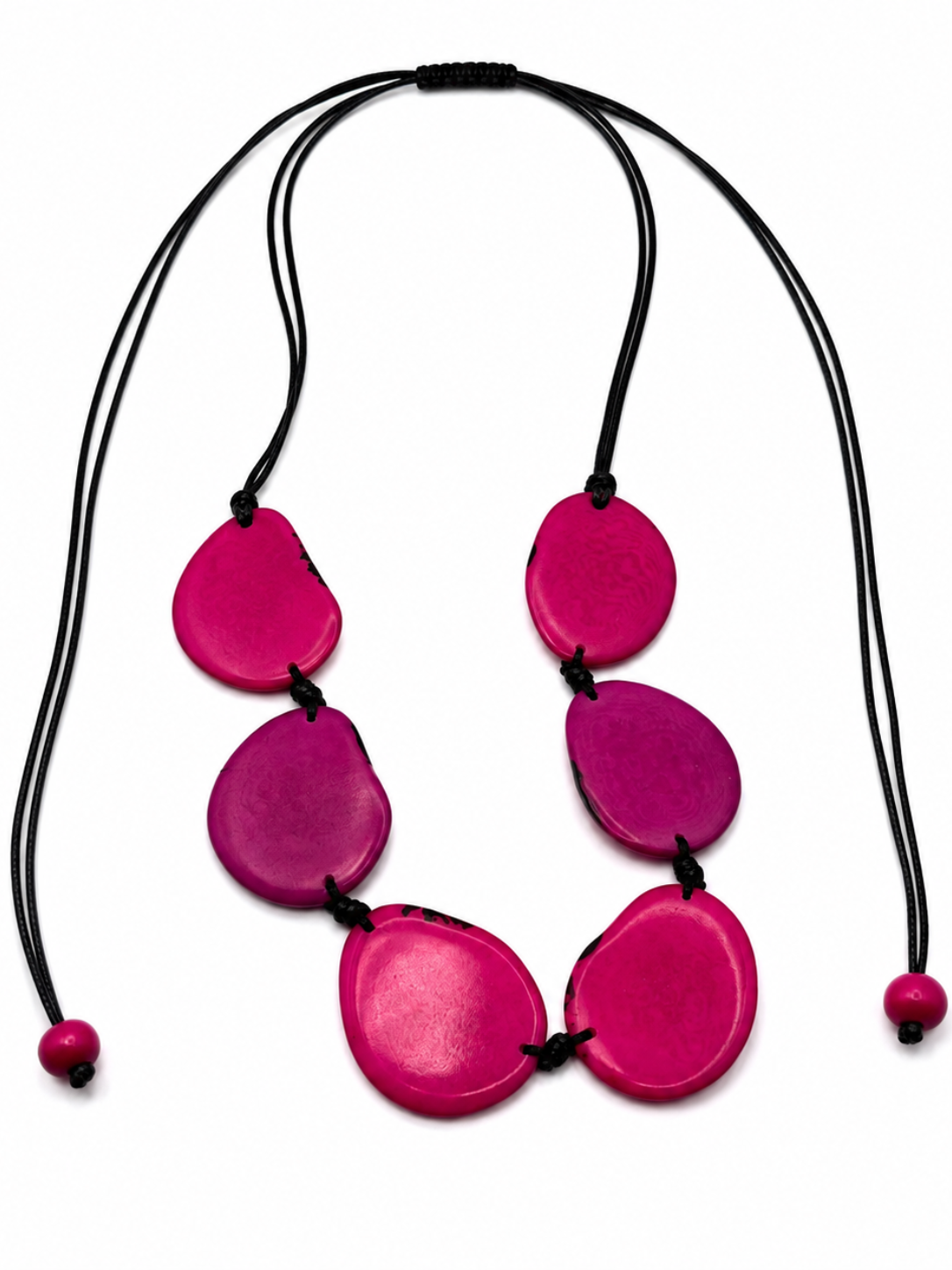 MÍSTIKA Tagua Sunlit Petals Necklace in Hot Pink – Adjustable black cord with 5 fuchsia tagua discs | Místika Style