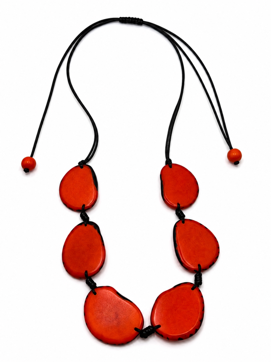 MÍSTIKA Tagua Sunlit Petals Necklace in Orange – Adjustable black cord with 5 bold orange-red tagua discs | Místika StylE