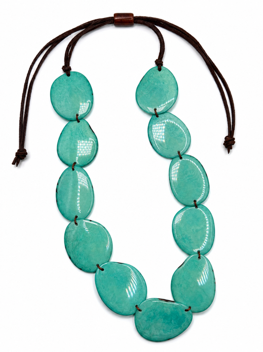 MÍSTIKA Tagua Sunlit Petals Necklace in Turquoise – Adjustable brown leather cord with 11 glossy turquoise tagua discs | Místika Style