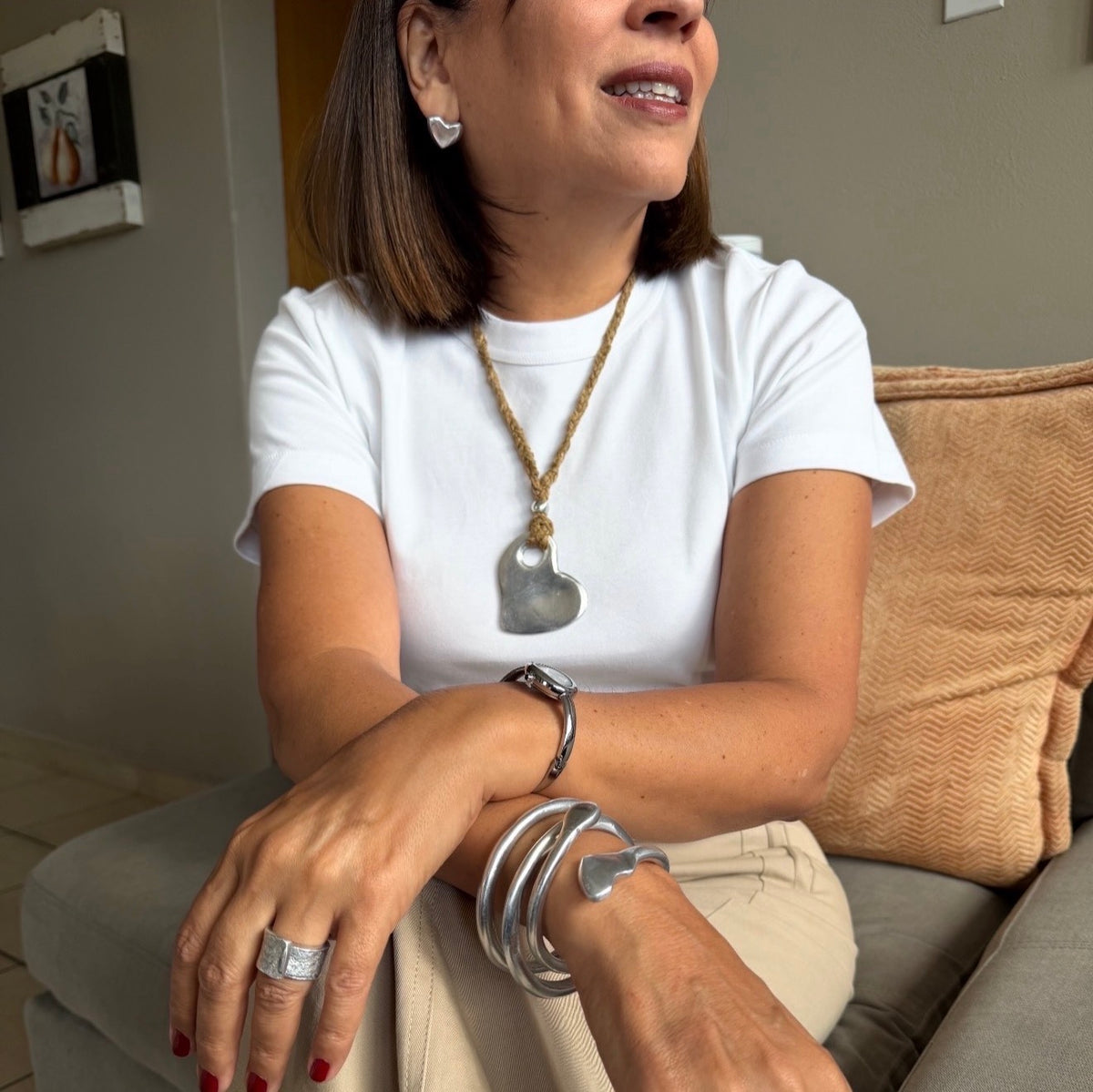 Model wearing VESTOPAZZO Rigid Bangle Set stacked with silver jewelry — editorial lifestyle look